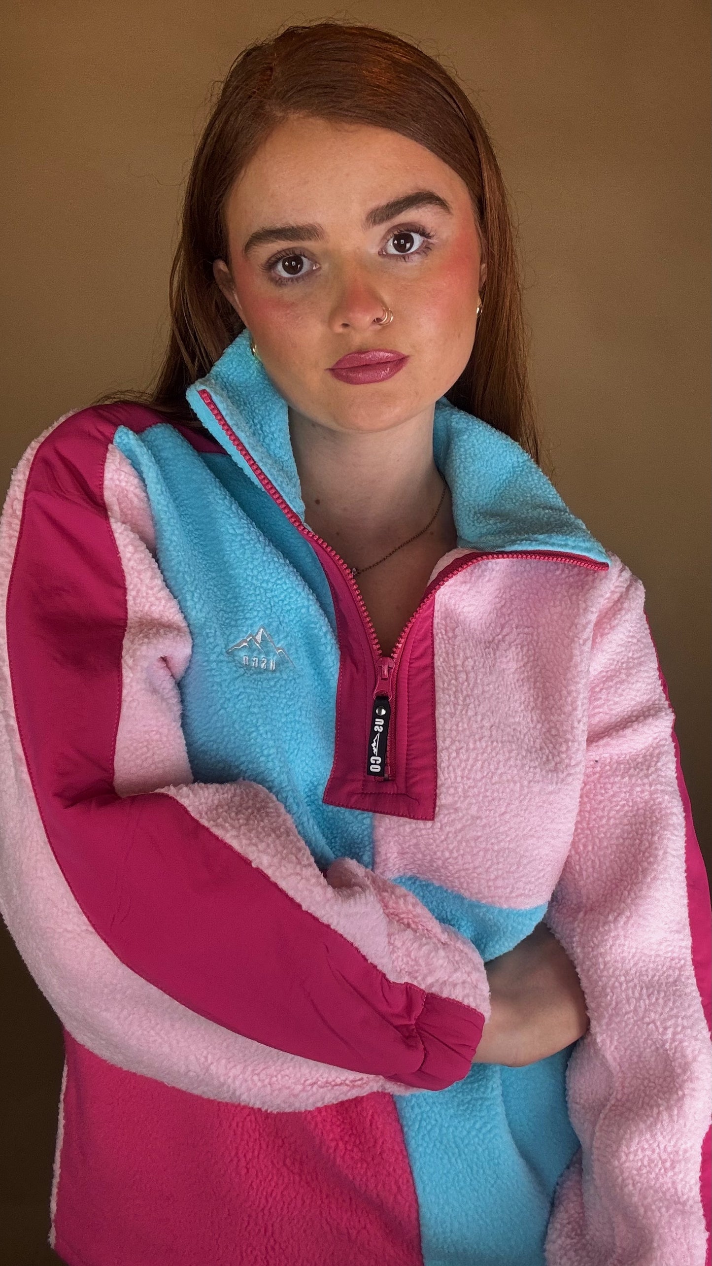 Evie fleece size down. Pockets & draw string