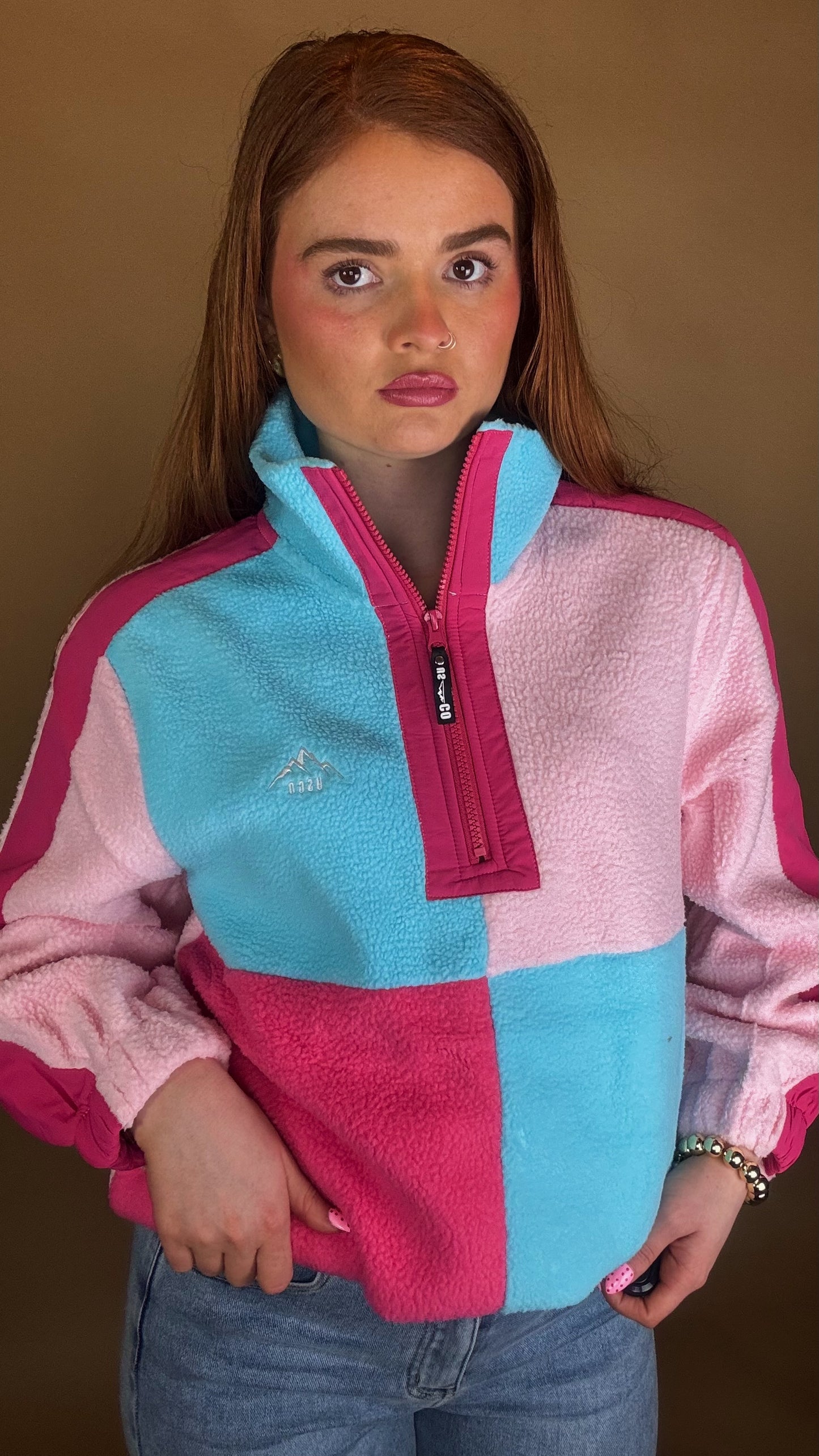 Evie fleece size down. Pockets & draw string