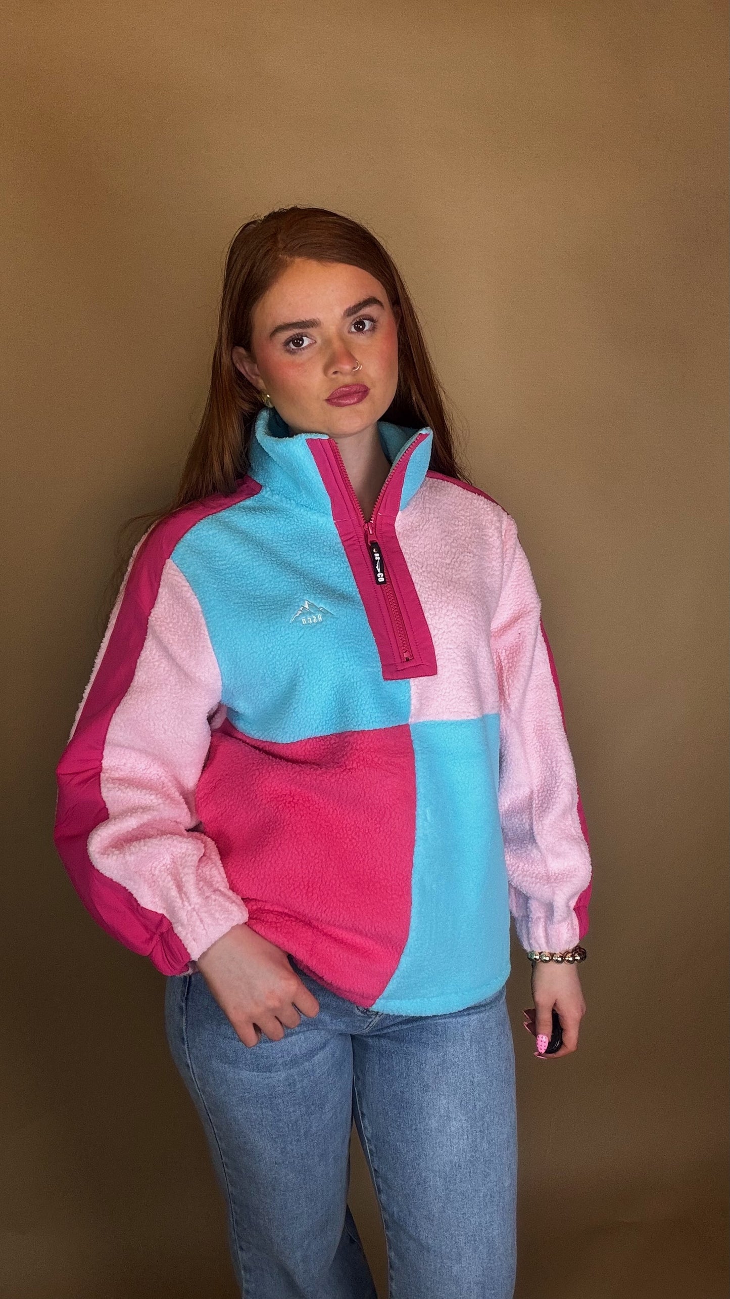 Evie fleece size down. Pockets & draw string