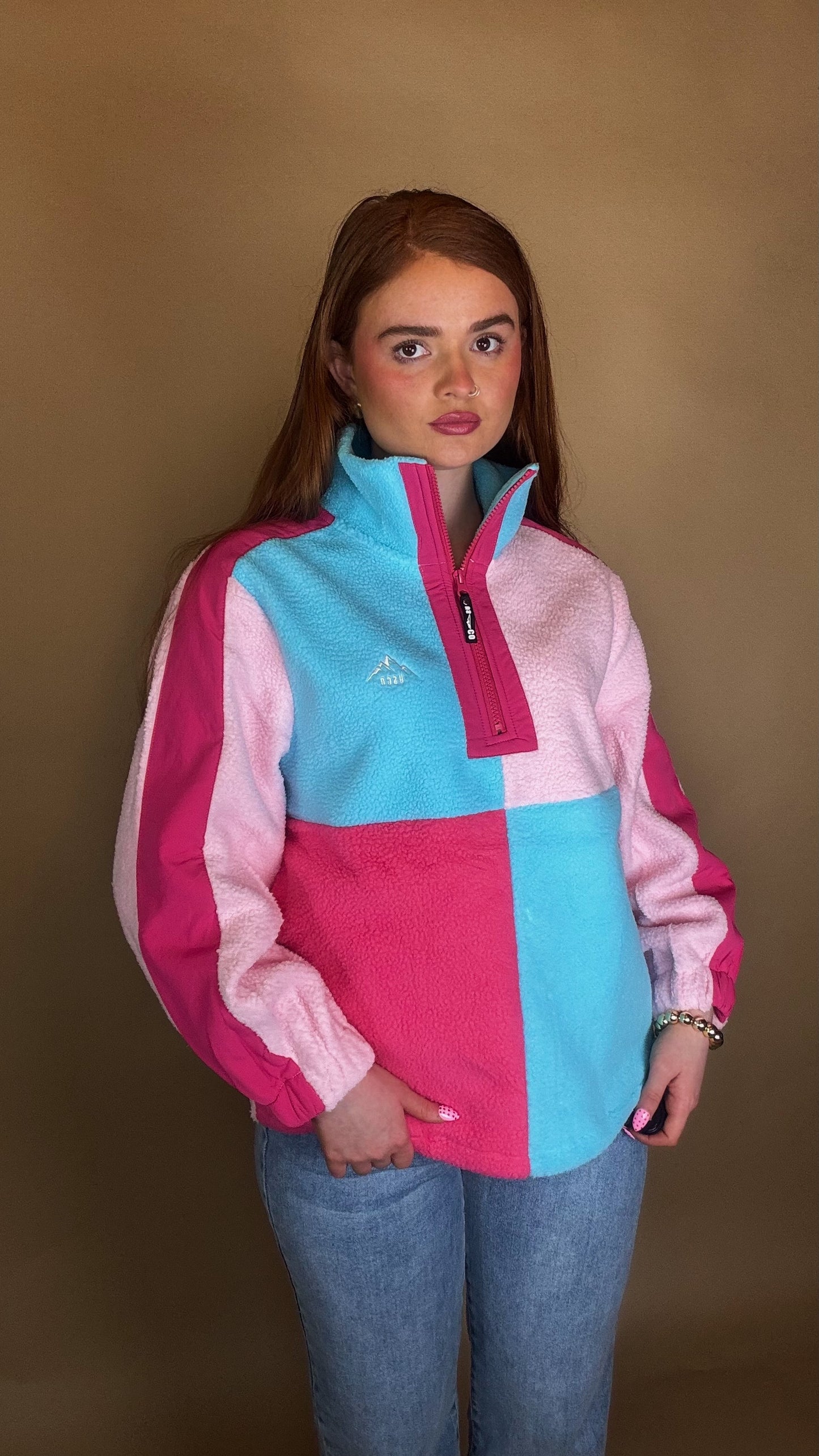 Evie fleece size down. Pockets & draw string