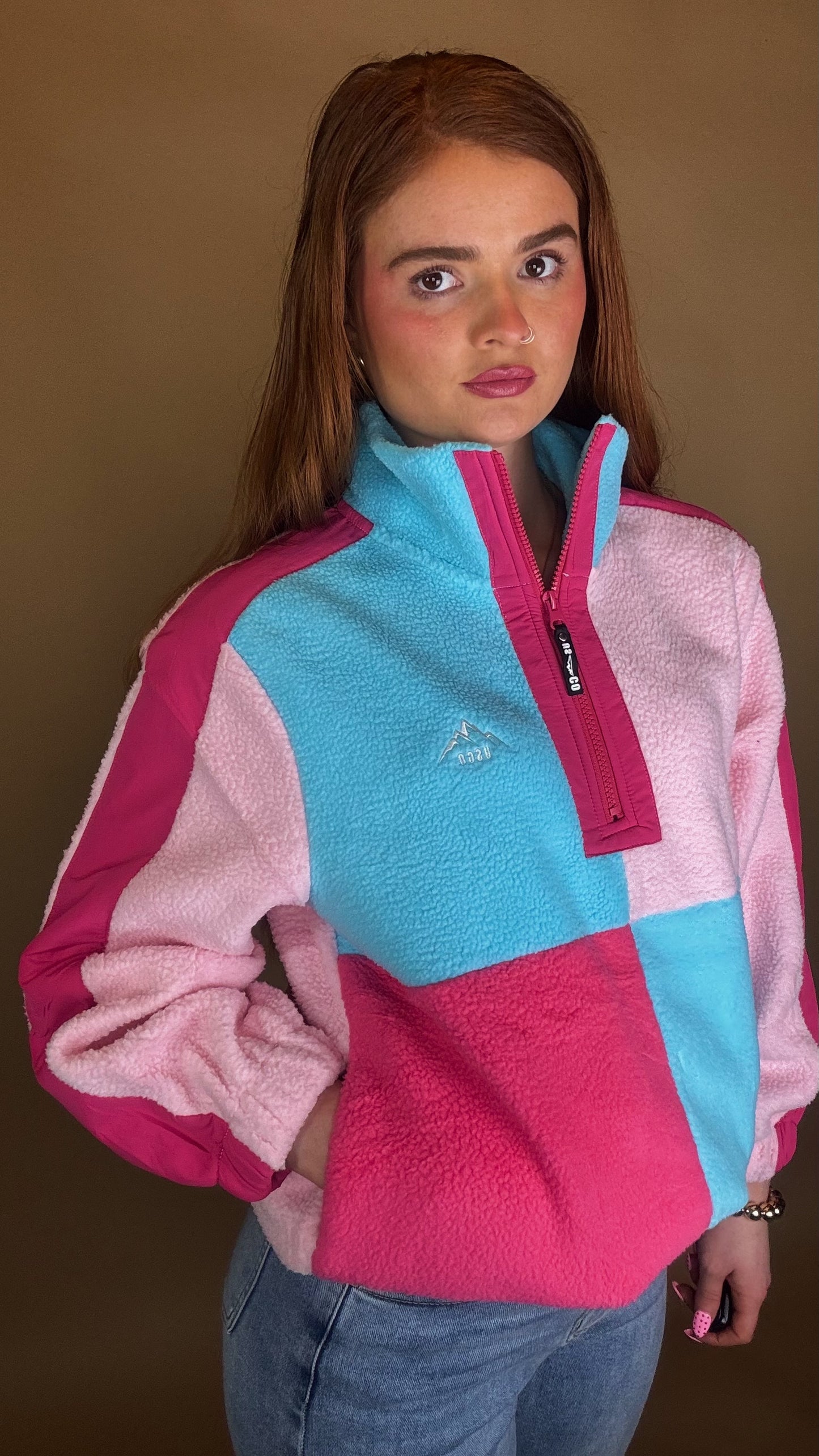 Evie fleece size down. Pockets & draw string