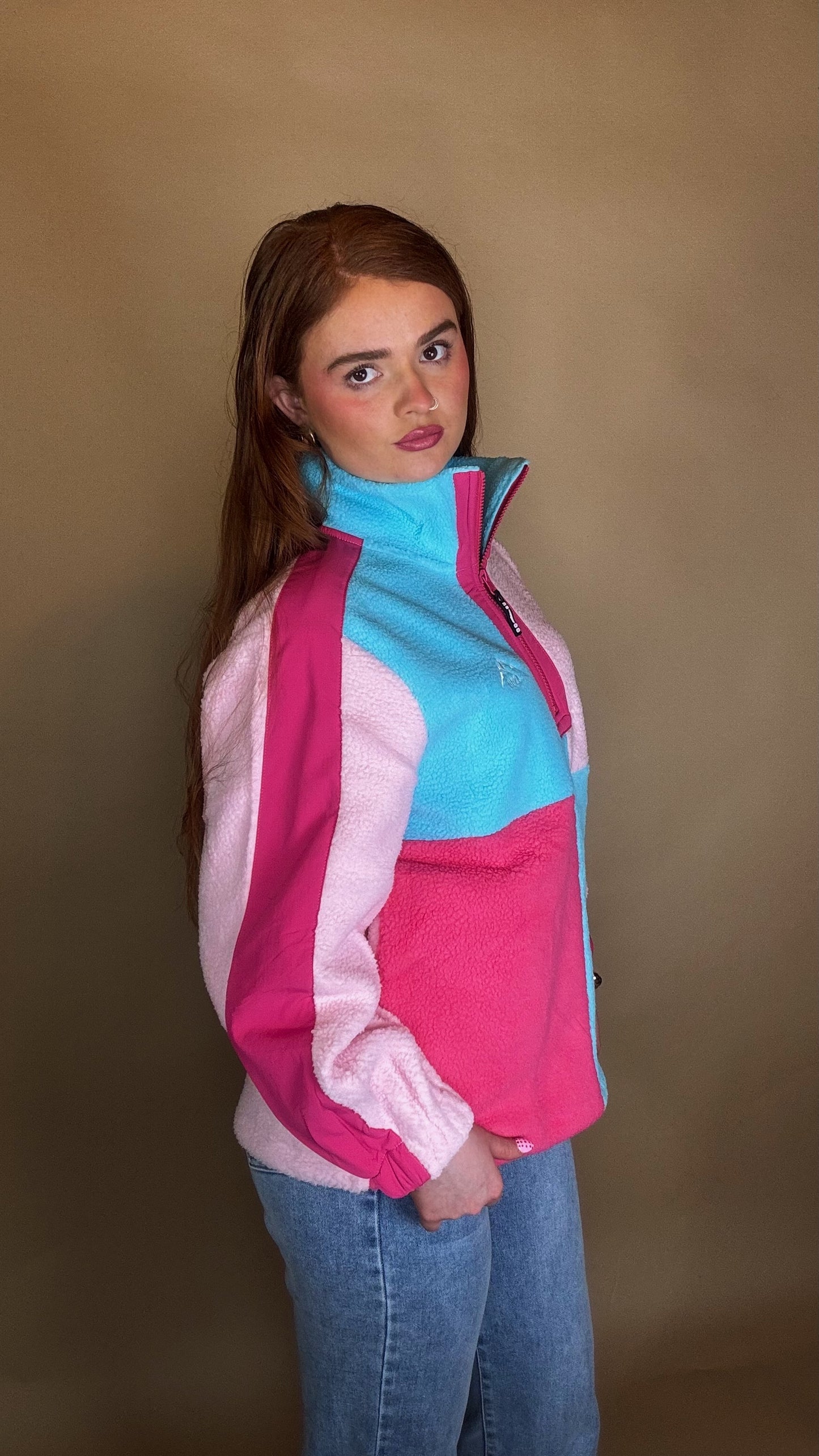 Evie fleece size down. Pockets & draw string