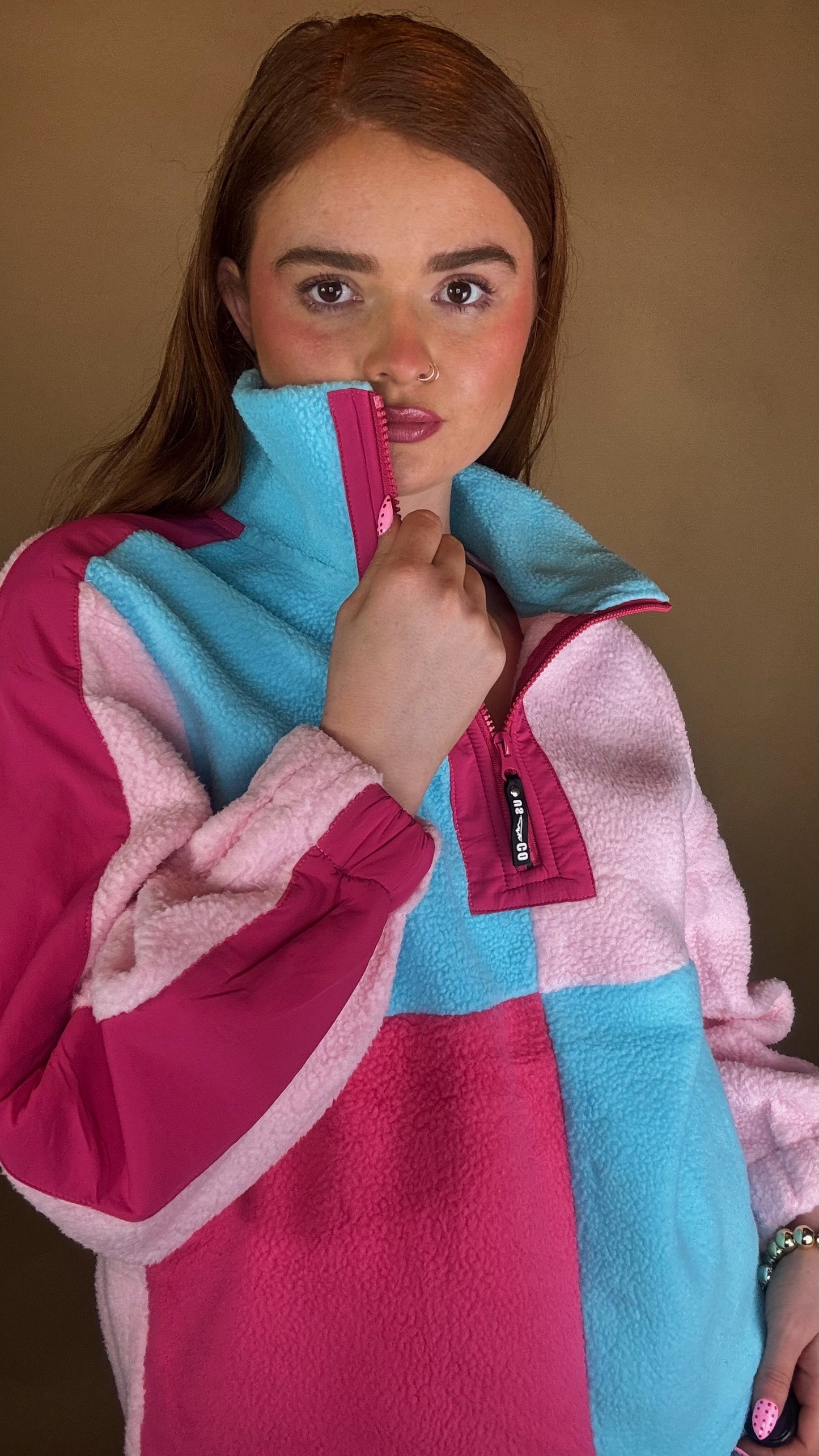 Evie fleece size down. Pockets & draw string